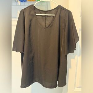 Women’s bat sleeve black top